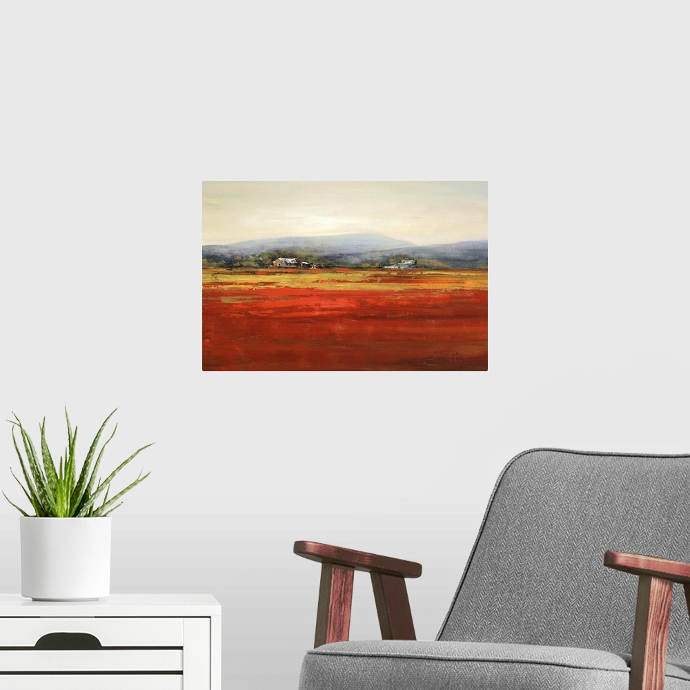 A modern room featuring Contemporary artwork of a farm landscape with a red field.