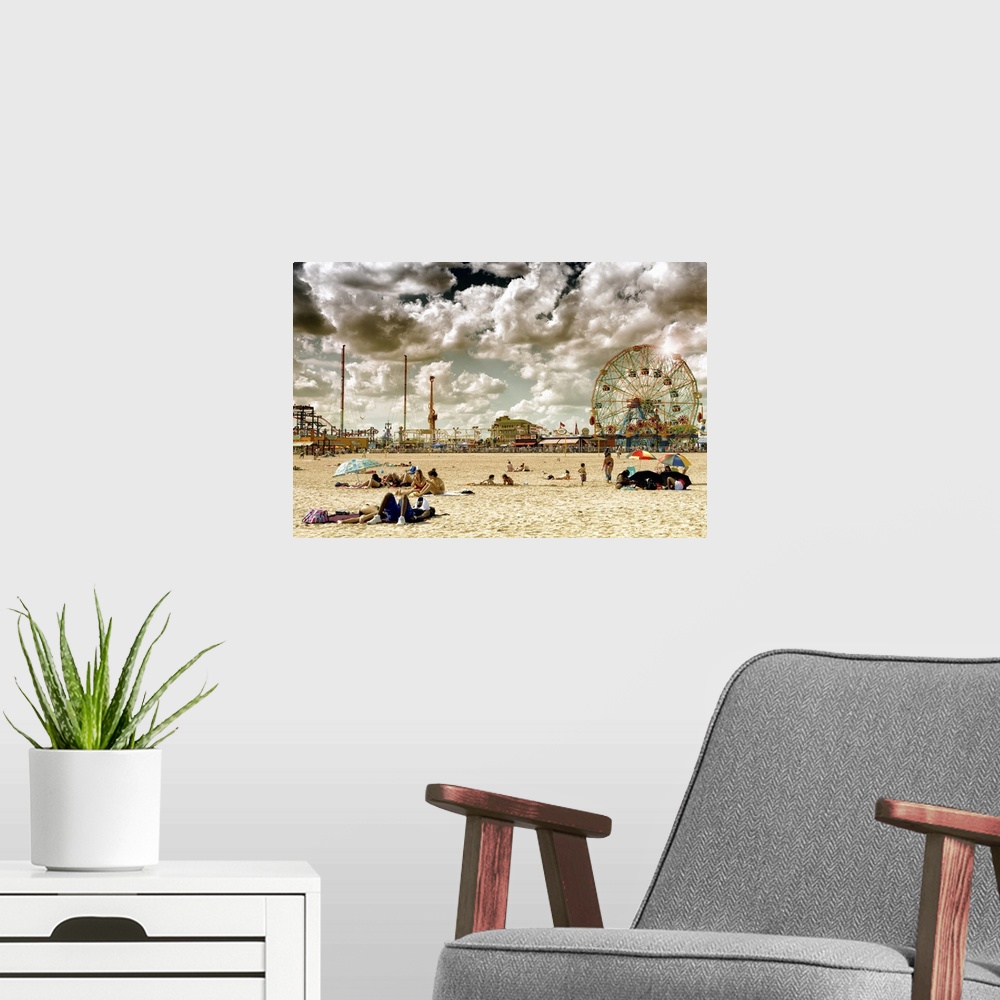 A modern room featuring Photo of dramatic clouds over the sandy beach of Coney Island with carnival rides in the background.