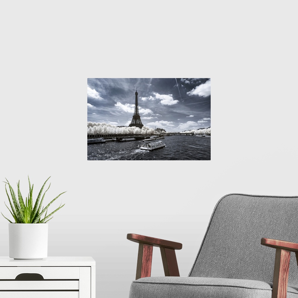 A modern room featuring A view of the Eiffel Tower in Paris, made in infrared mode in summer. The vegetation is white and...