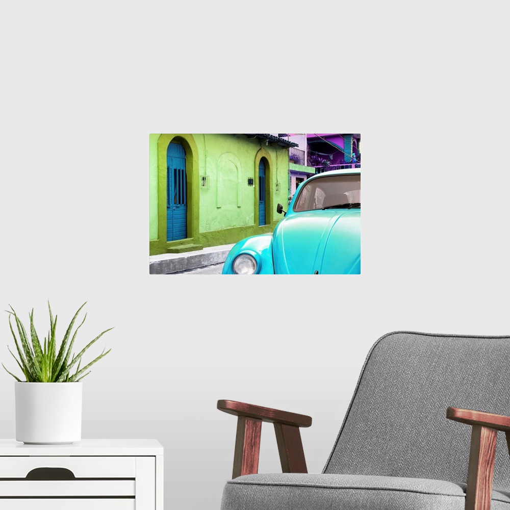 A modern room featuring Close-up photograph of a light blue Volkswagen Beetle parked next to colorful houses. From the Vi...