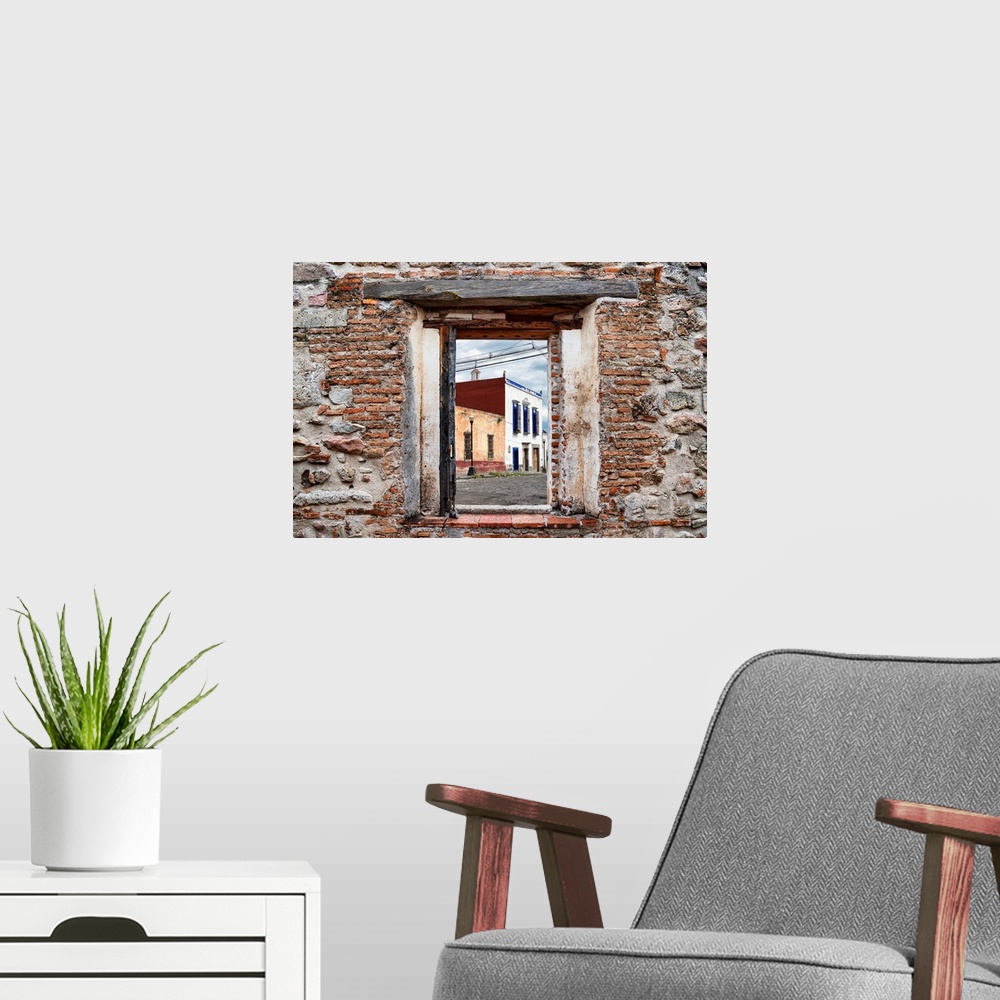 A modern room featuring View of a streetscape in Mexico framed through a stony, brick window. From the Viva Mexico Window...
