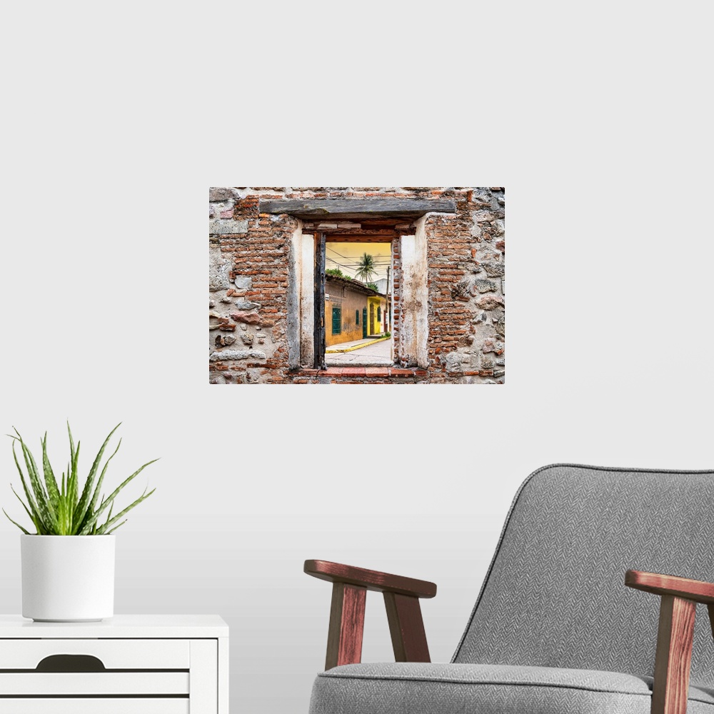 A modern room featuring View of a street scene in Mexico framed through a stony, brick window. From the Viva Mexico Windo...