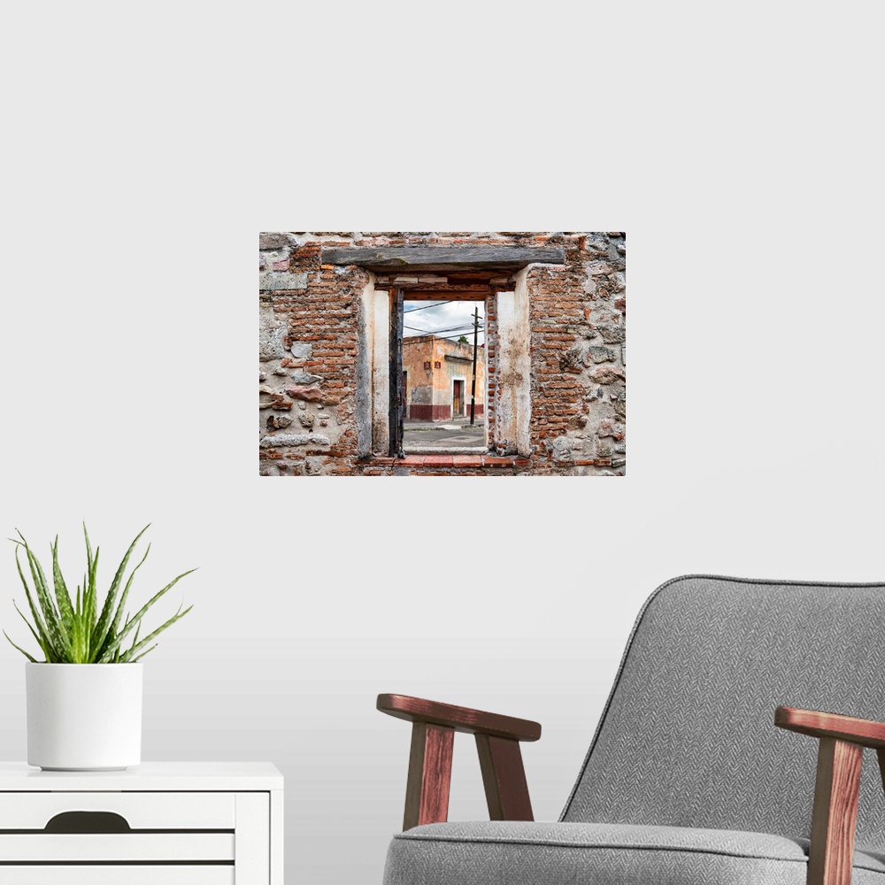 A modern room featuring View of a streetscape in Mexico framed through a stony, brick window. From the Viva Mexico Window...