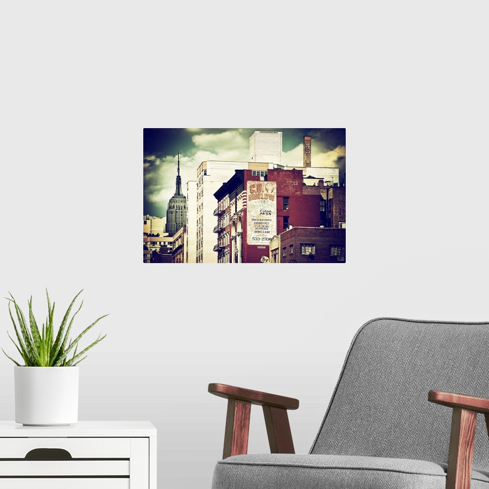 A modern room featuring Vintage style photo showing the sides of New York buildings.
