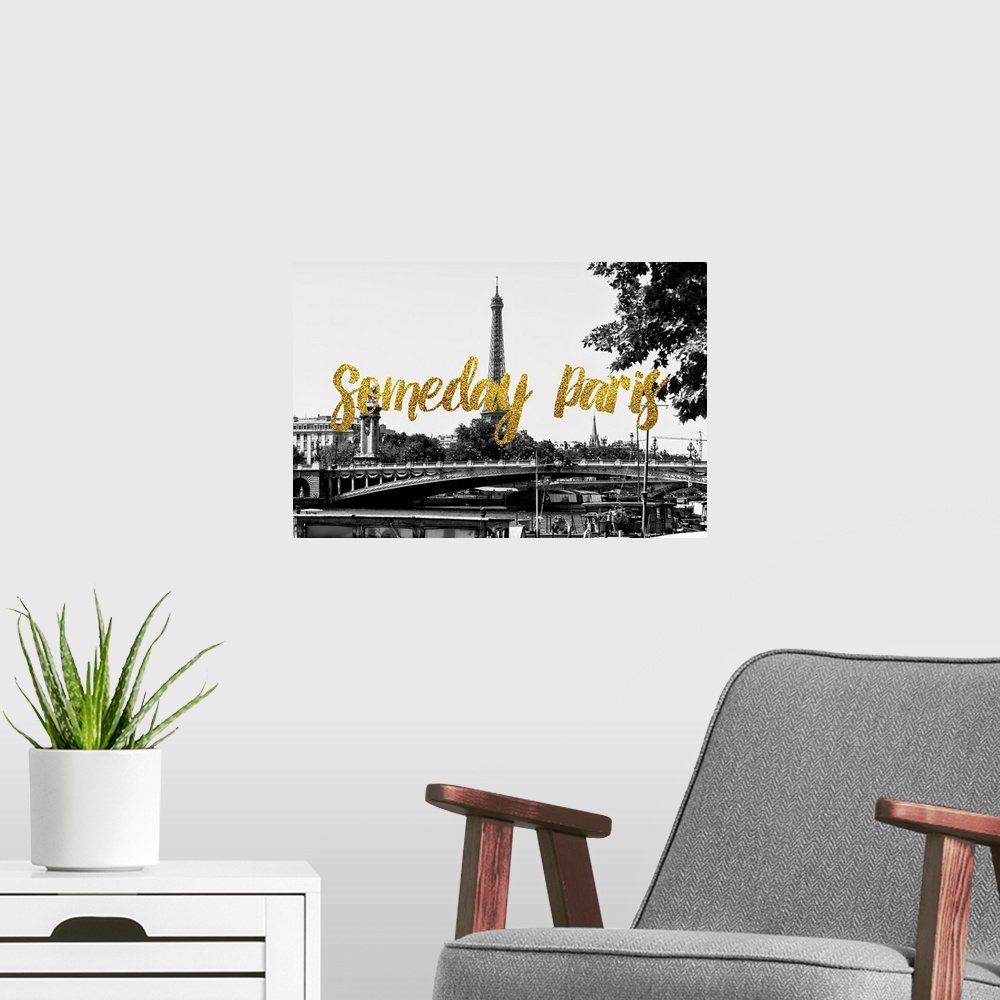 A modern room featuring Black and white photograph of a bridge in Paris, France with the Eiffel Tower in the background a...