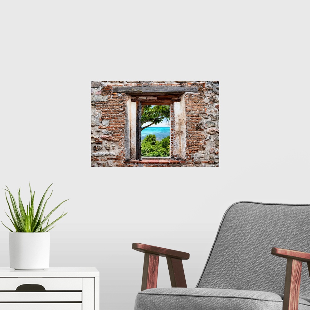 A modern room featuring View of Isla Mujeres, Mexico, framed through a stony, brick window. From the Viva Mexico Window V...