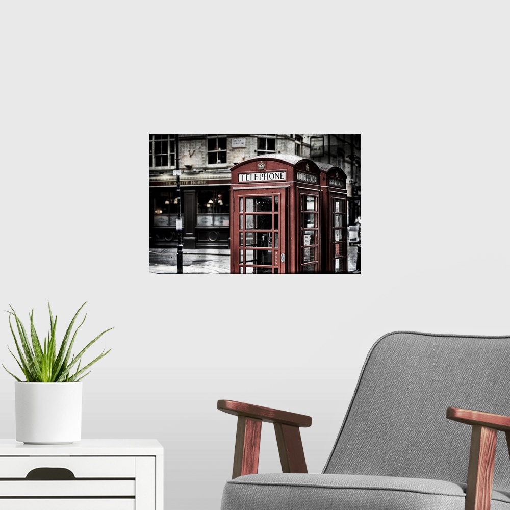 A modern room featuring Fine art photograph of an iconic red phone booth in London, England.