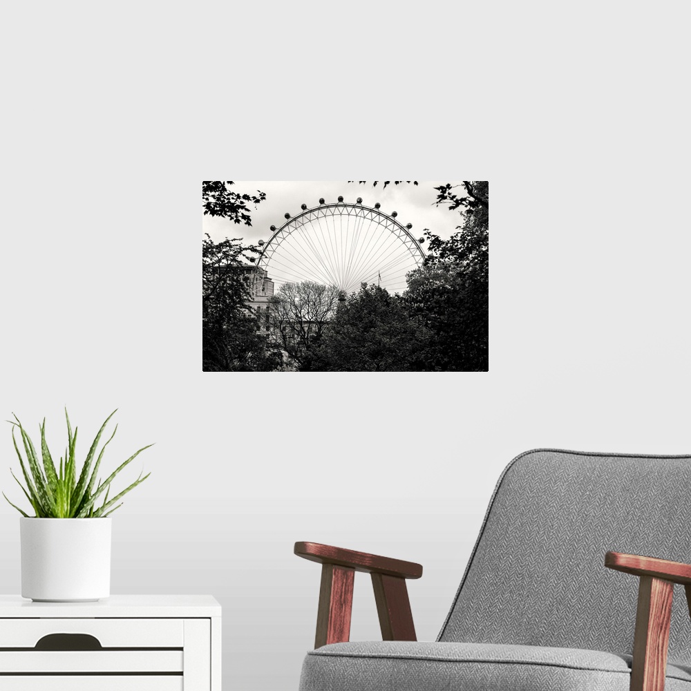 A modern room featuring Black and white photo of the London Eye behind trees in London, England.