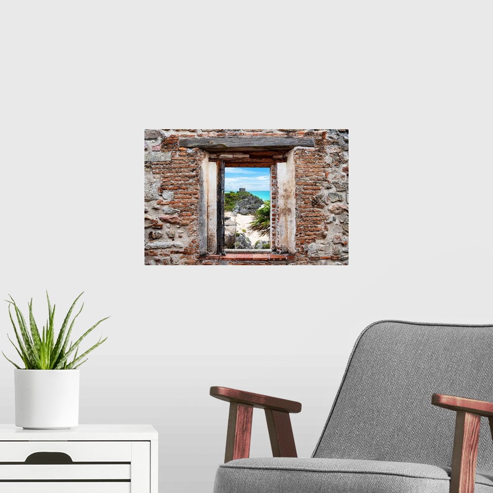 A modern room featuring View of the Tulum ruins along Caribbean coastline framed through a stony, brick window. From the ...