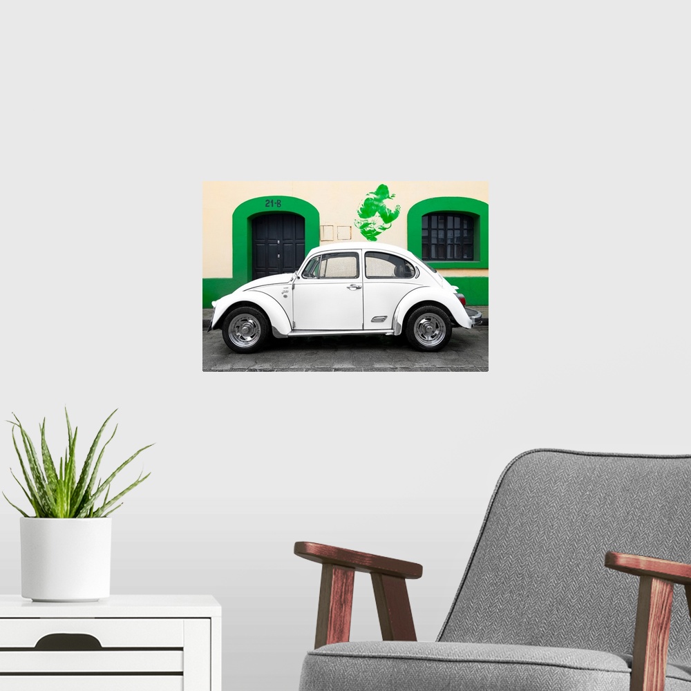 A modern room featuring Photograph of a classic white Volkswagen Beetle parked in front of a building with a green trim w...