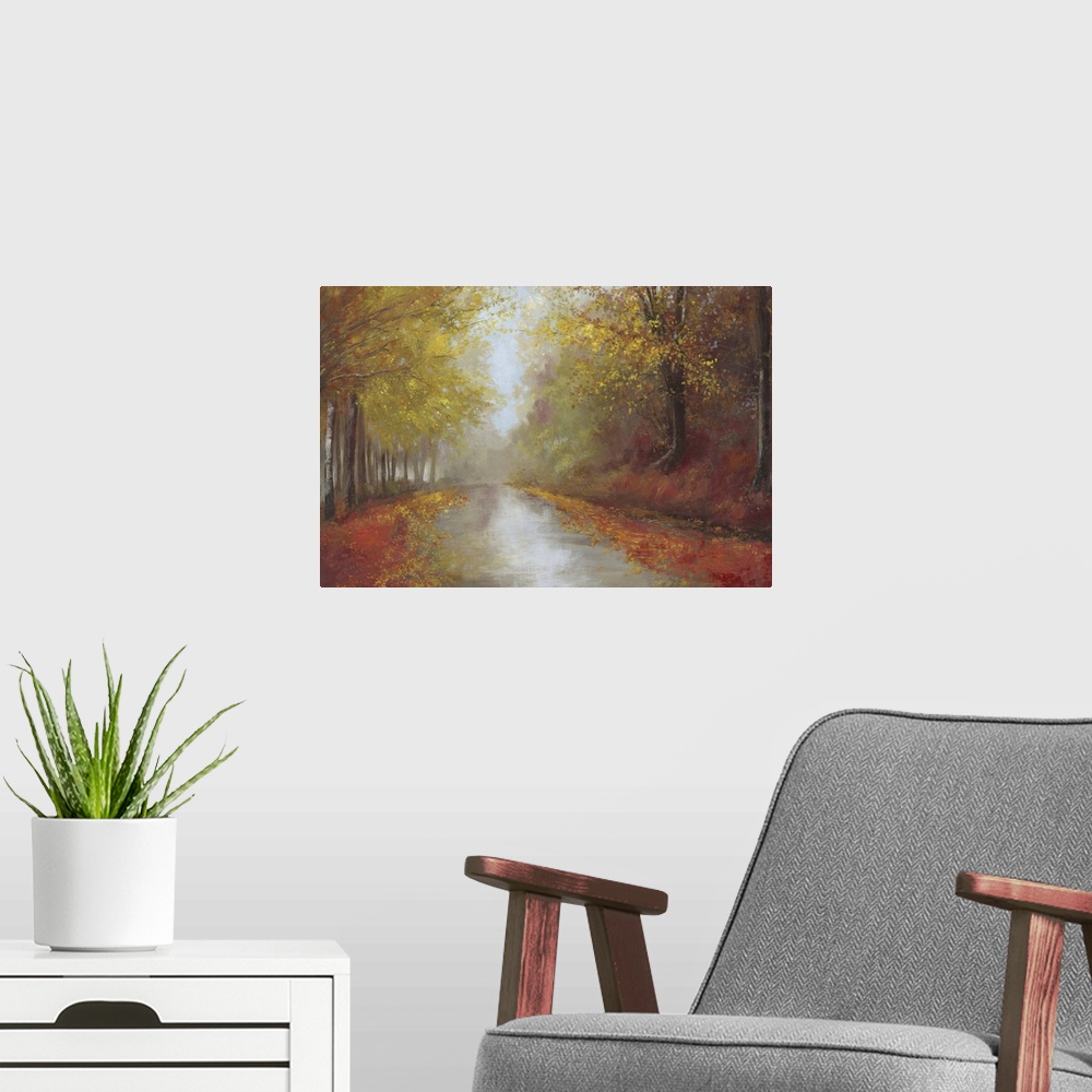 A modern room featuring Contemporary home decor artwork of a road leading down through an autumn forest.