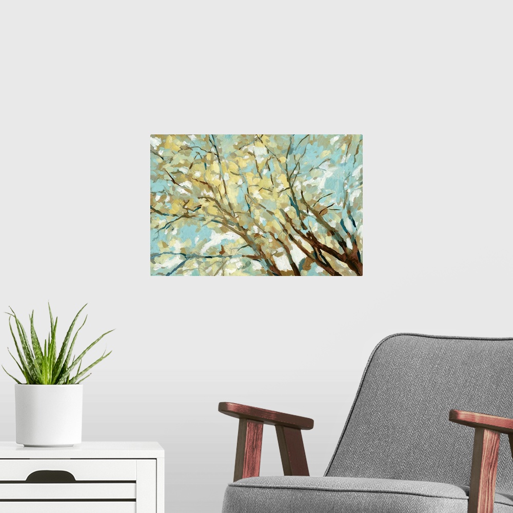 A modern room featuring Contemporary painting of branches with yellow and blue leaves.