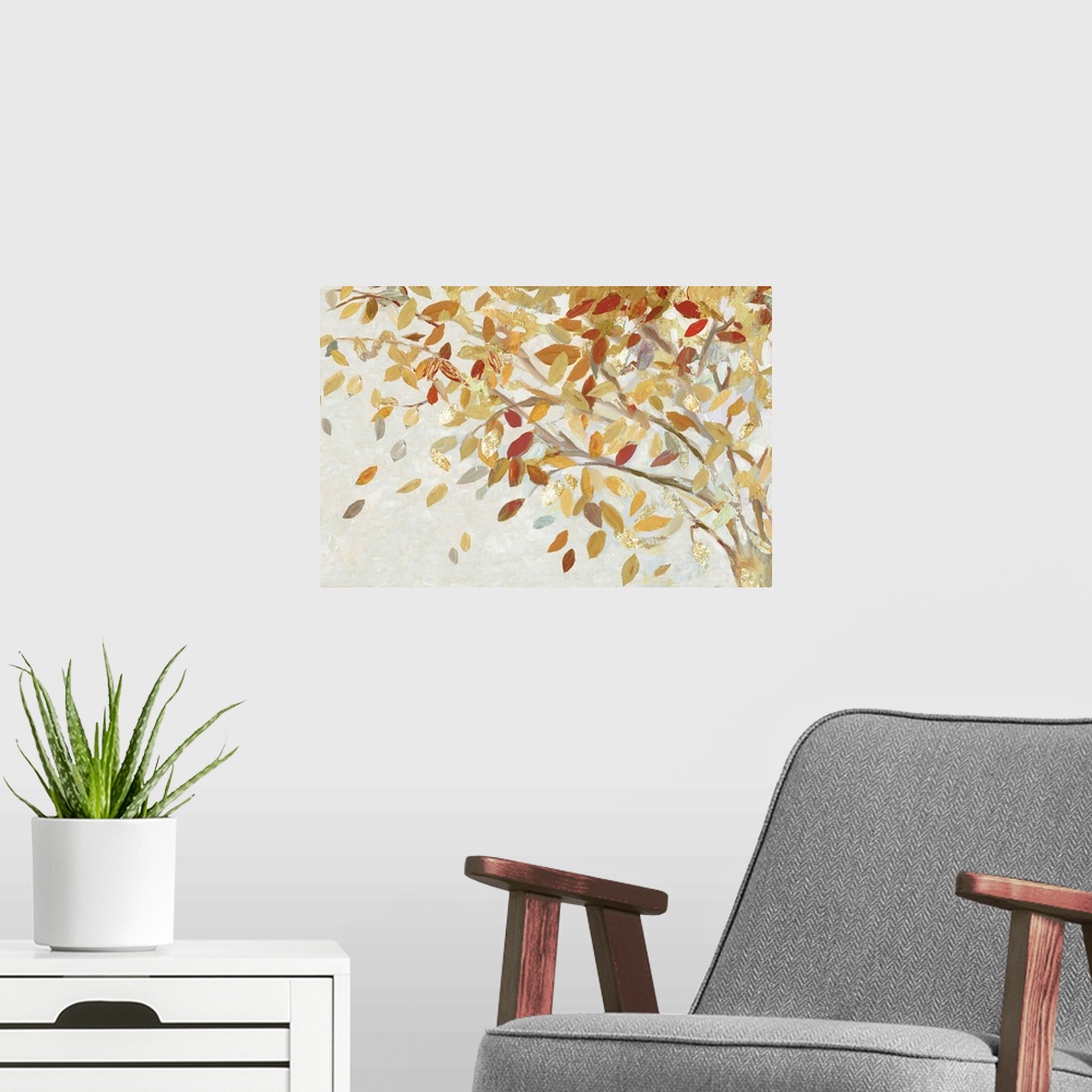 A modern room featuring A horizontal painting of a branch full of autumn leaves with gold accents.