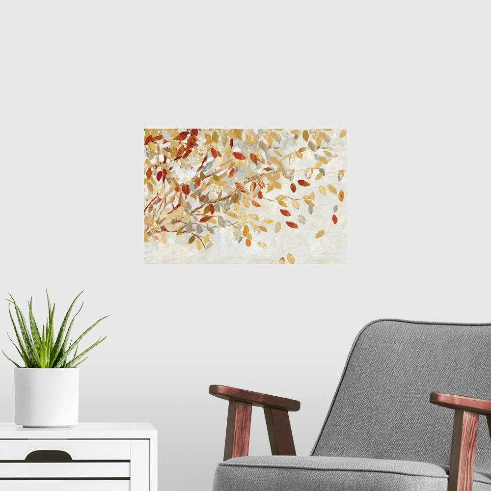 A modern room featuring A horizontal painting of a branch full of autumn leaves with gold accents.