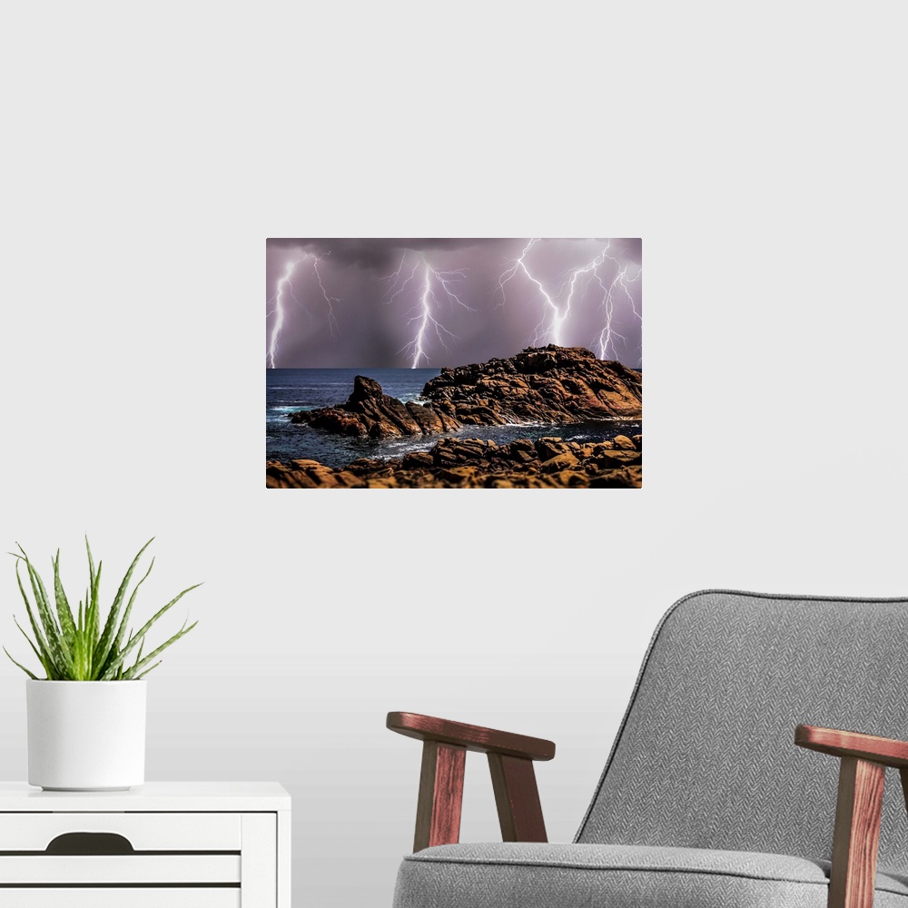A modern room featuring Canal Rocks, South Western part of Western Australia, during a lightning storm.