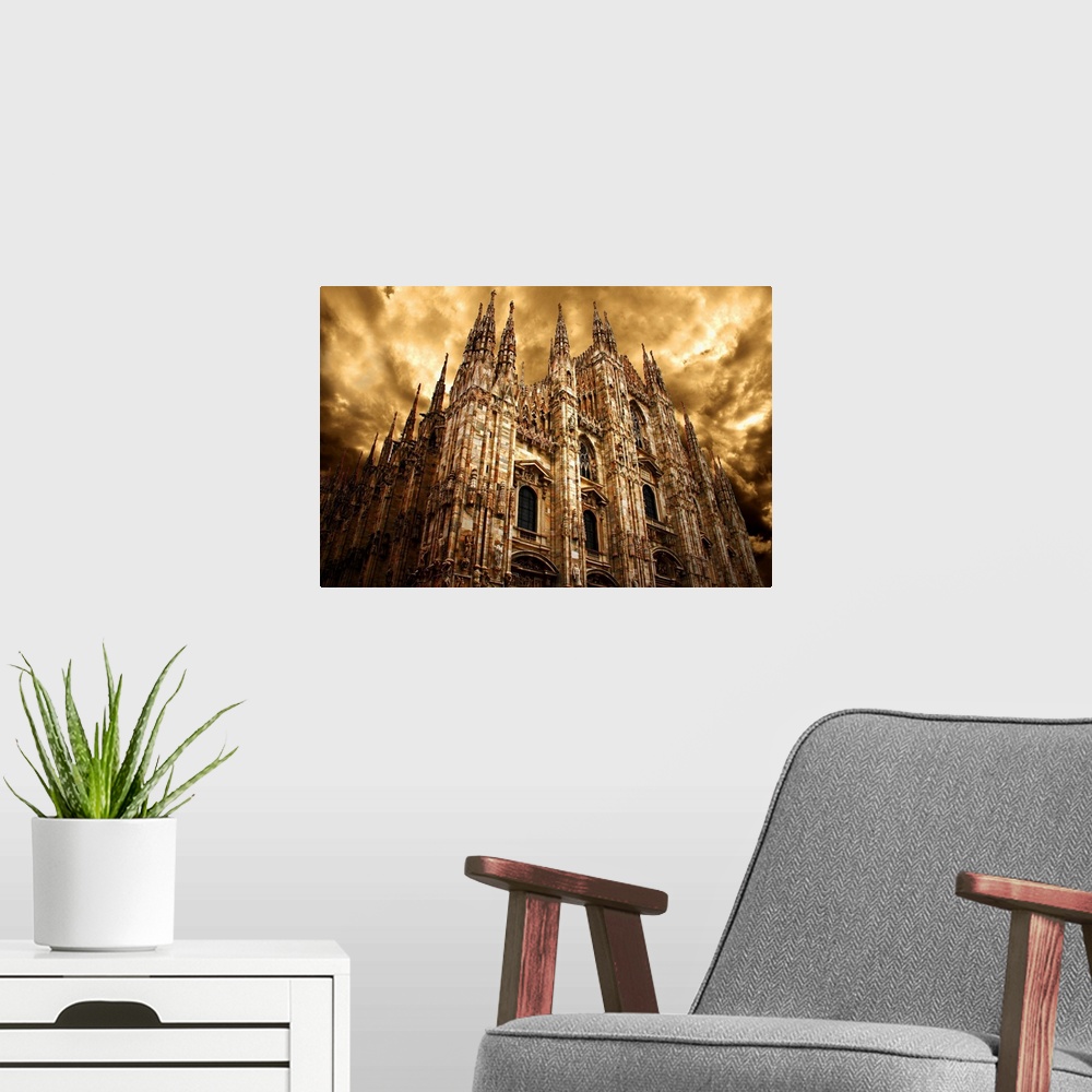 A modern room featuring Milan Cathedral under a cloudy sky in golden light.