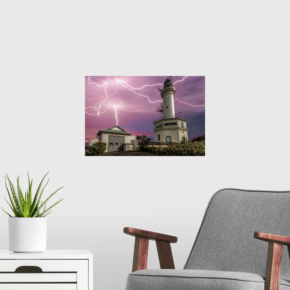 A modern room featuring Lightning strikes over the lighthouse at Point Lonsdale, Victoria, Australia.