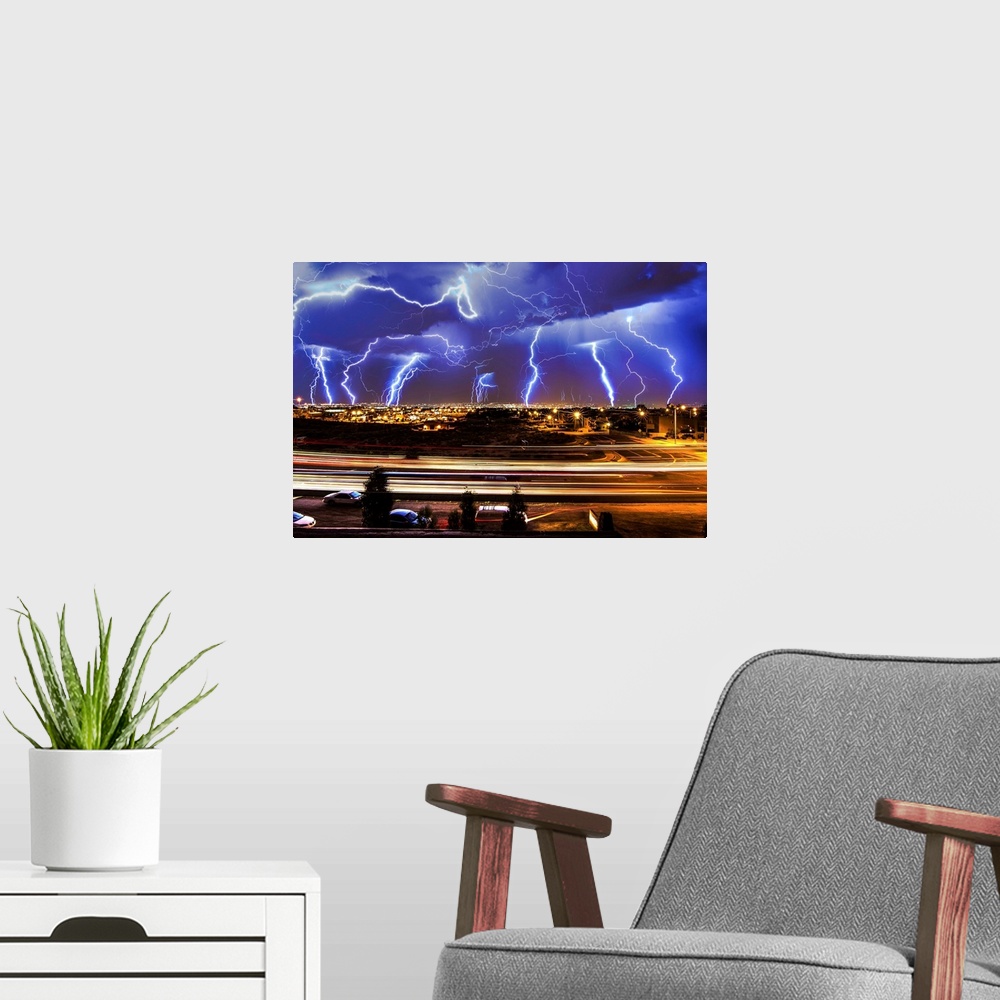 A modern room featuring Multiple exposures of a lightning storm over New Mexico.