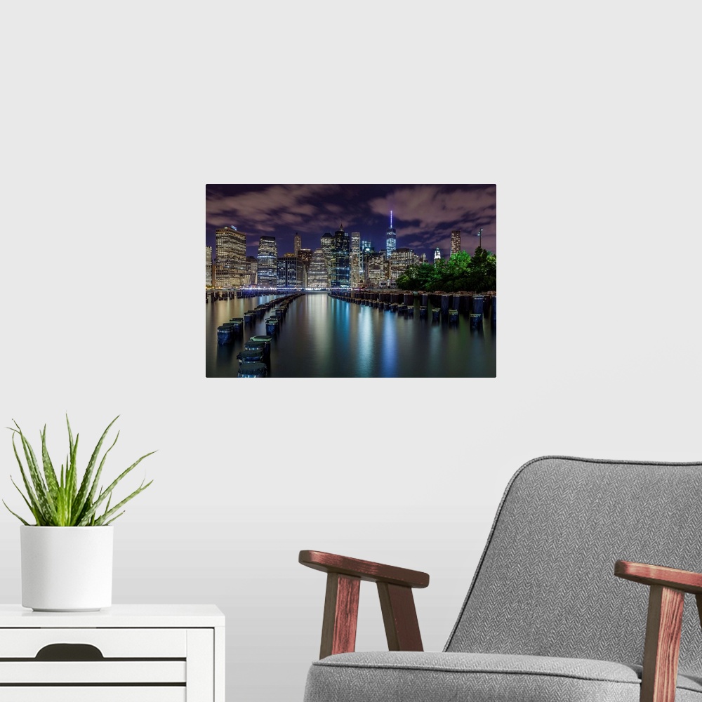 A modern room featuring Shot from Brooklyn Bridge park at night.