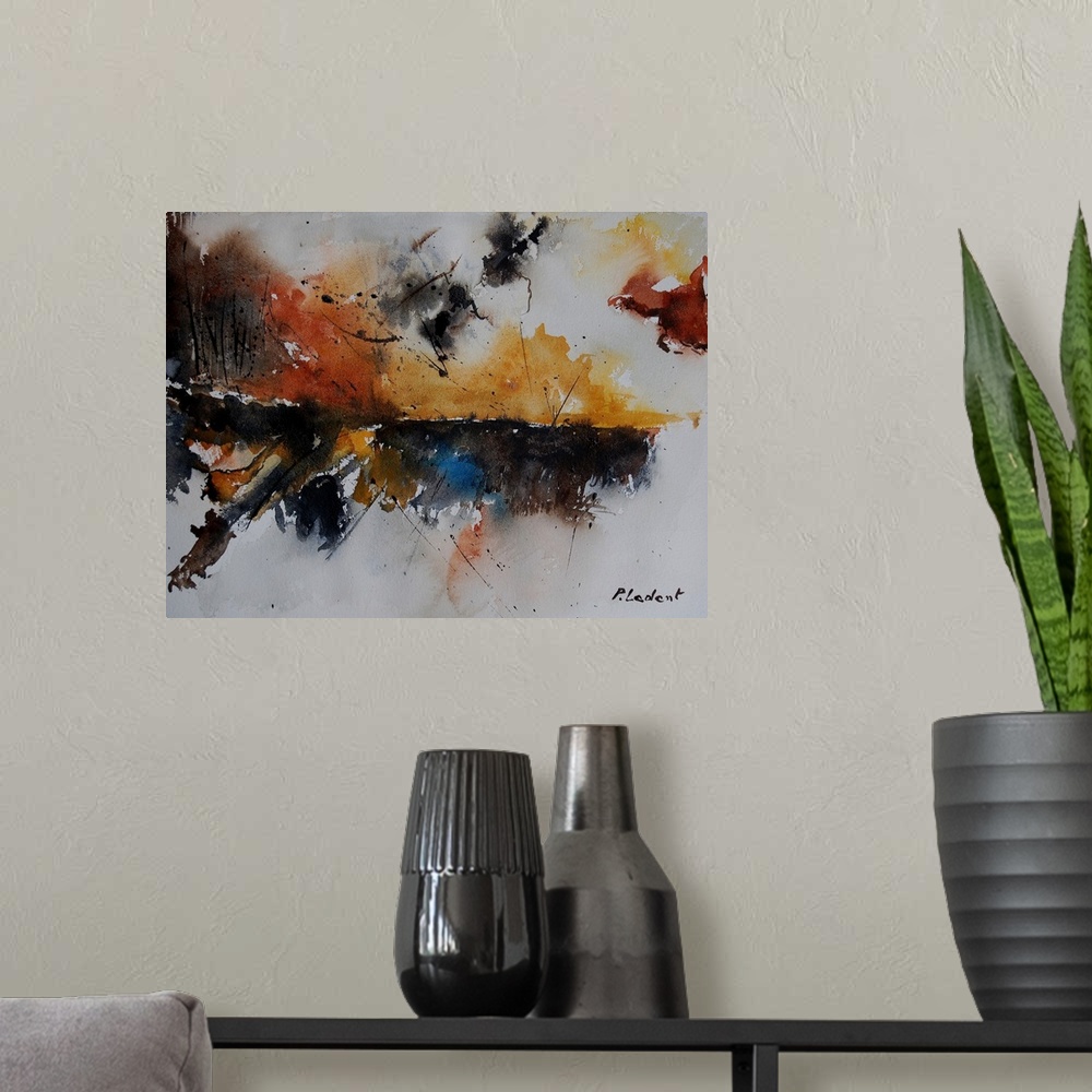 A modern room featuring A horizontal watercolor landscape in blotches of color in brown, orange, yellow and blue.