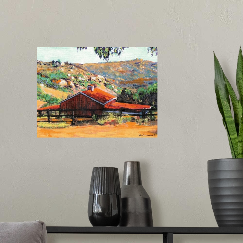 A modern room featuring Painting of a red barn at a ranch in San Diego with rolling hills in the background.