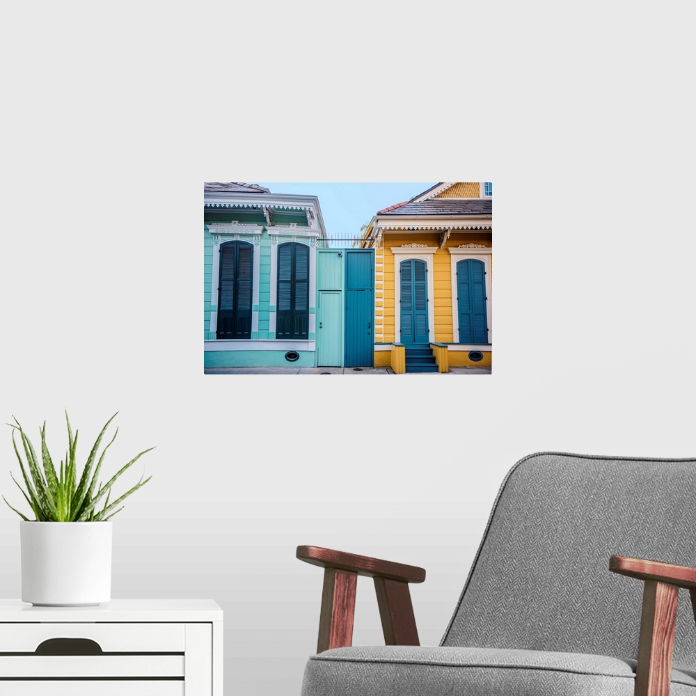 A modern room featuring View of brightly colored residences in New Orleans, Louisiana.