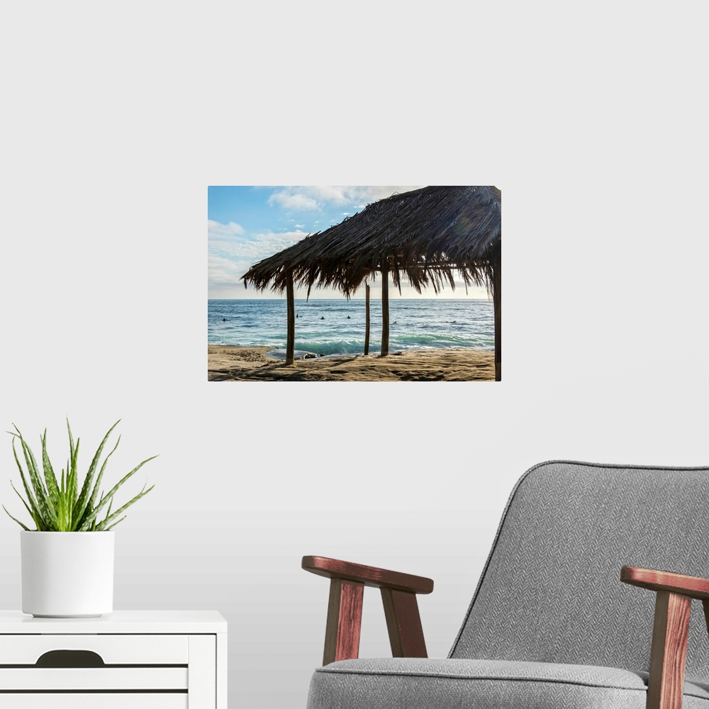 A modern room featuring Photograph of a cabana made with natural materials on the shore of Windansea Beach, San Diego on ...