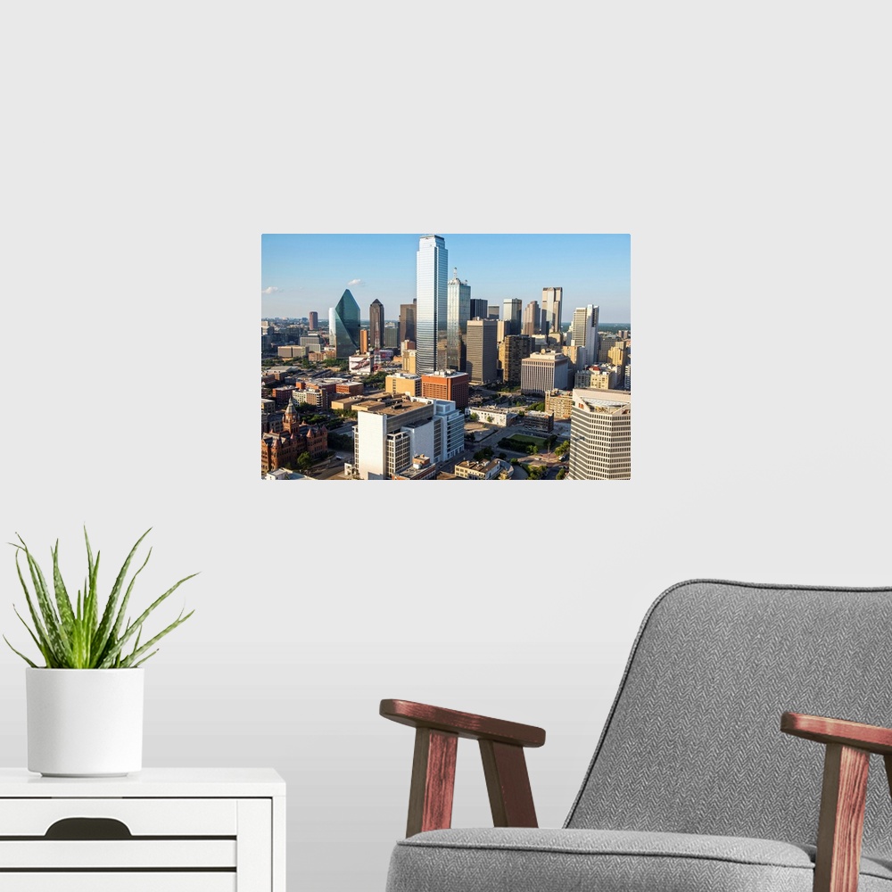 A modern room featuring An aerial view of the city of Dallas Texas.