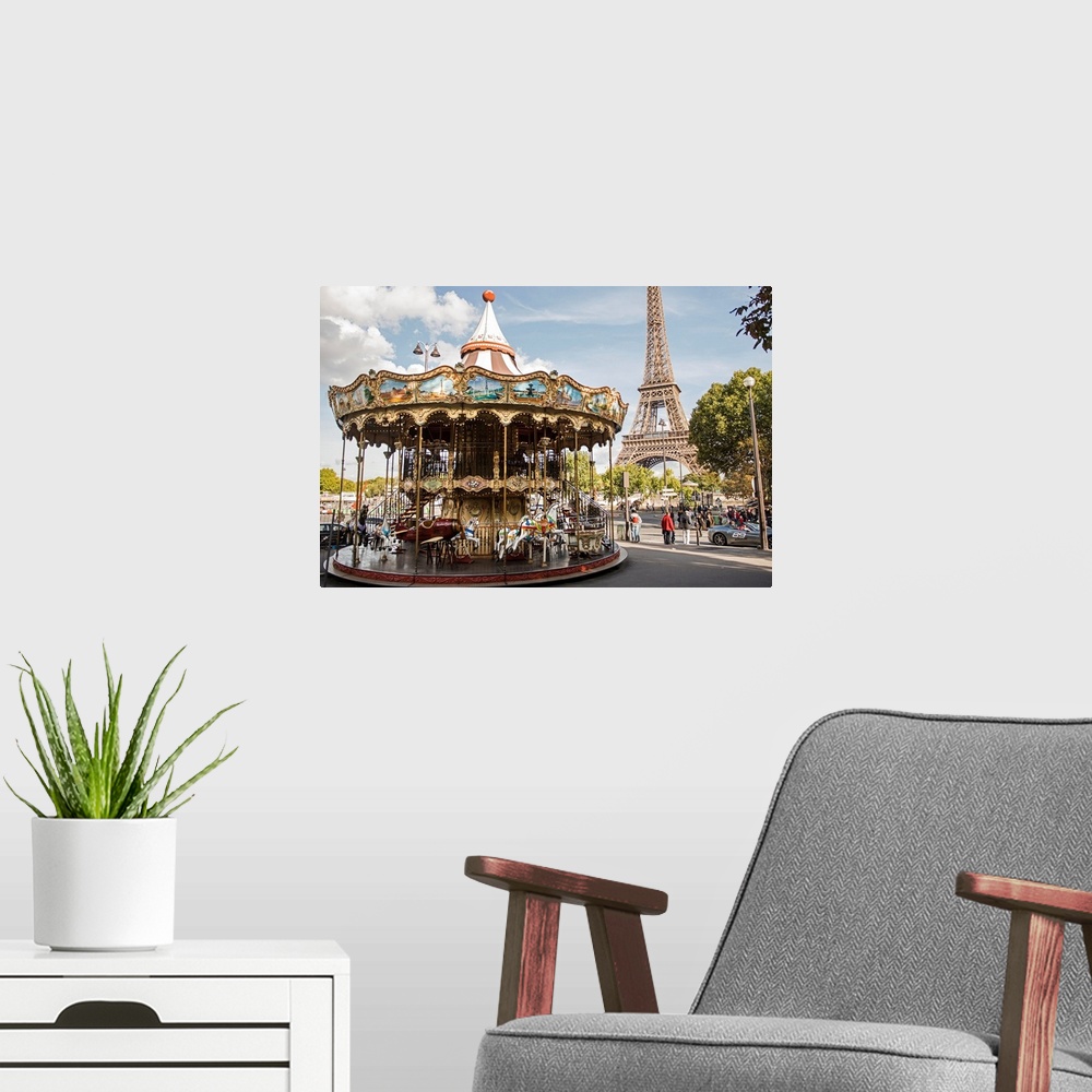 A modern room featuring Photograph of the Eiffel Tower Carousel with the Eiffel Tower in the background.