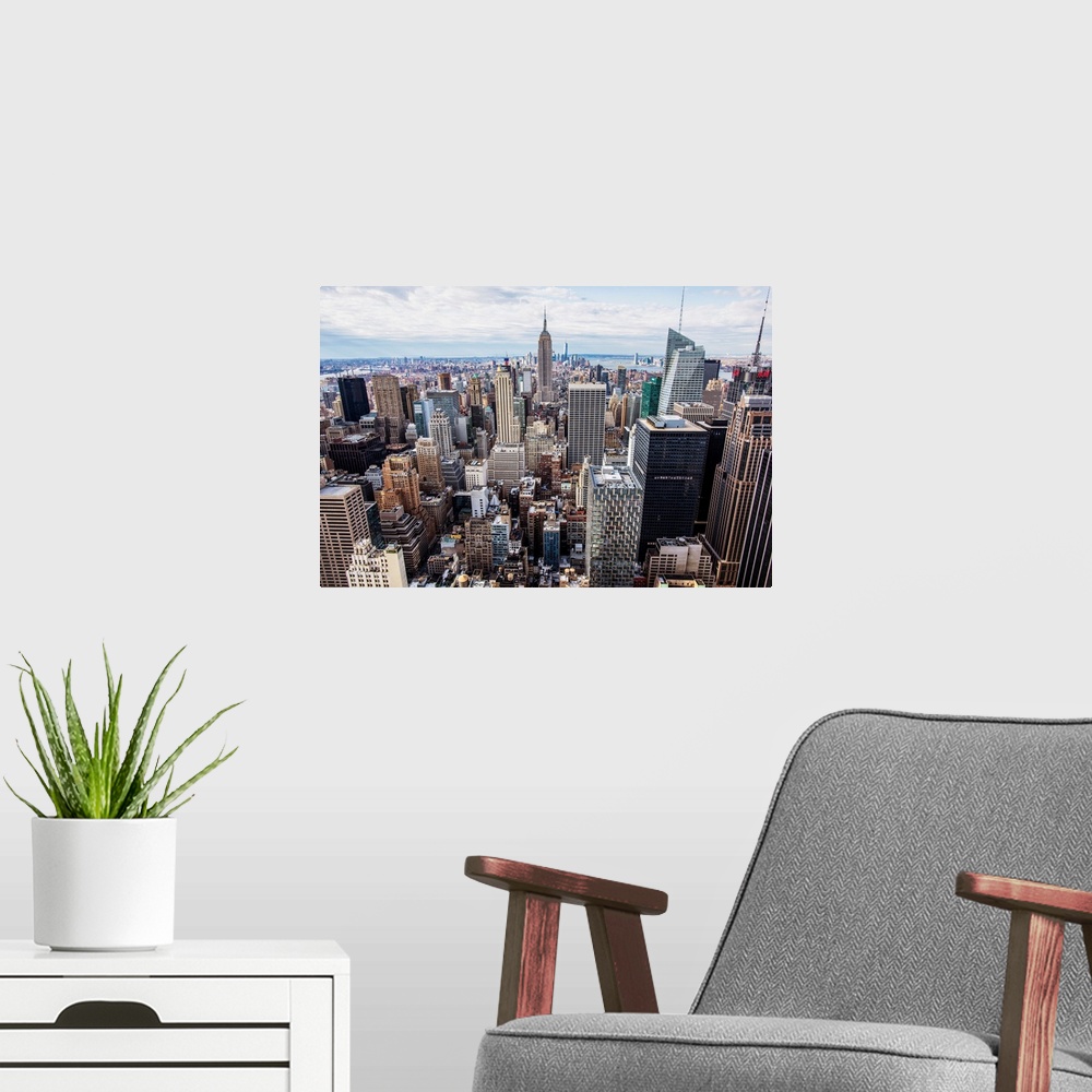 A modern room featuring Elevated view of metropolitan New York City in New York.