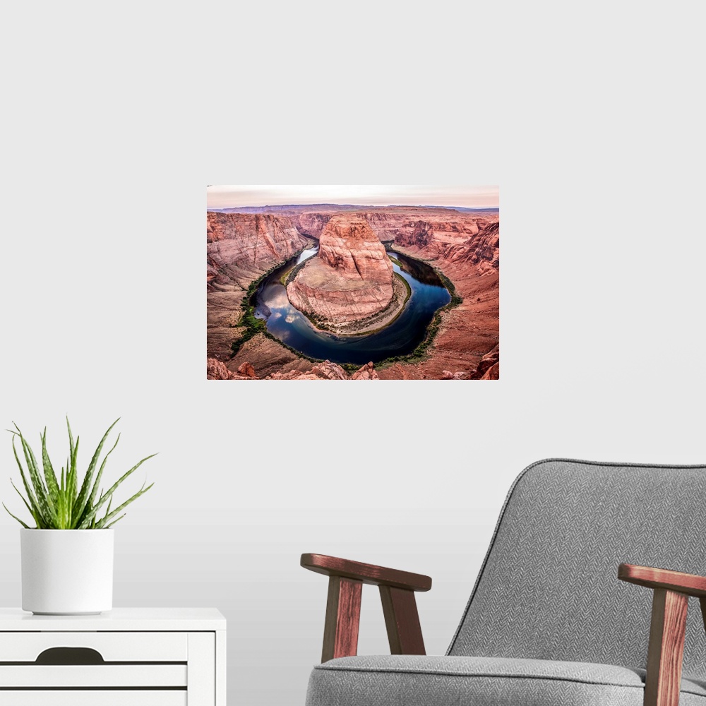 A modern room featuring Landscape photograph of Horseshoe Bend in Arizona with the blue and green Colorado River reflecti...