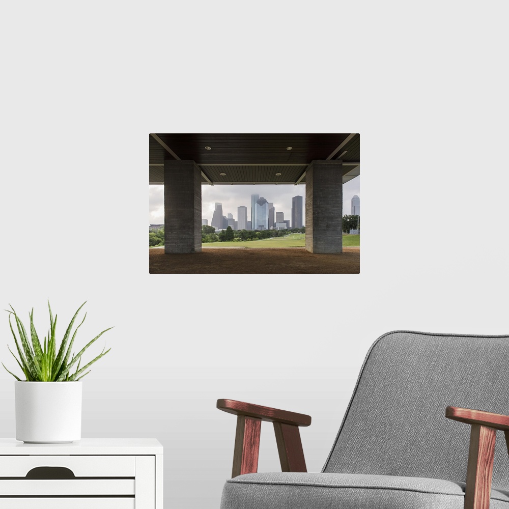 A modern room featuring Photograph of the Houston Skyline surrounded by clouds viewed from Eleanor Tinsley Park.