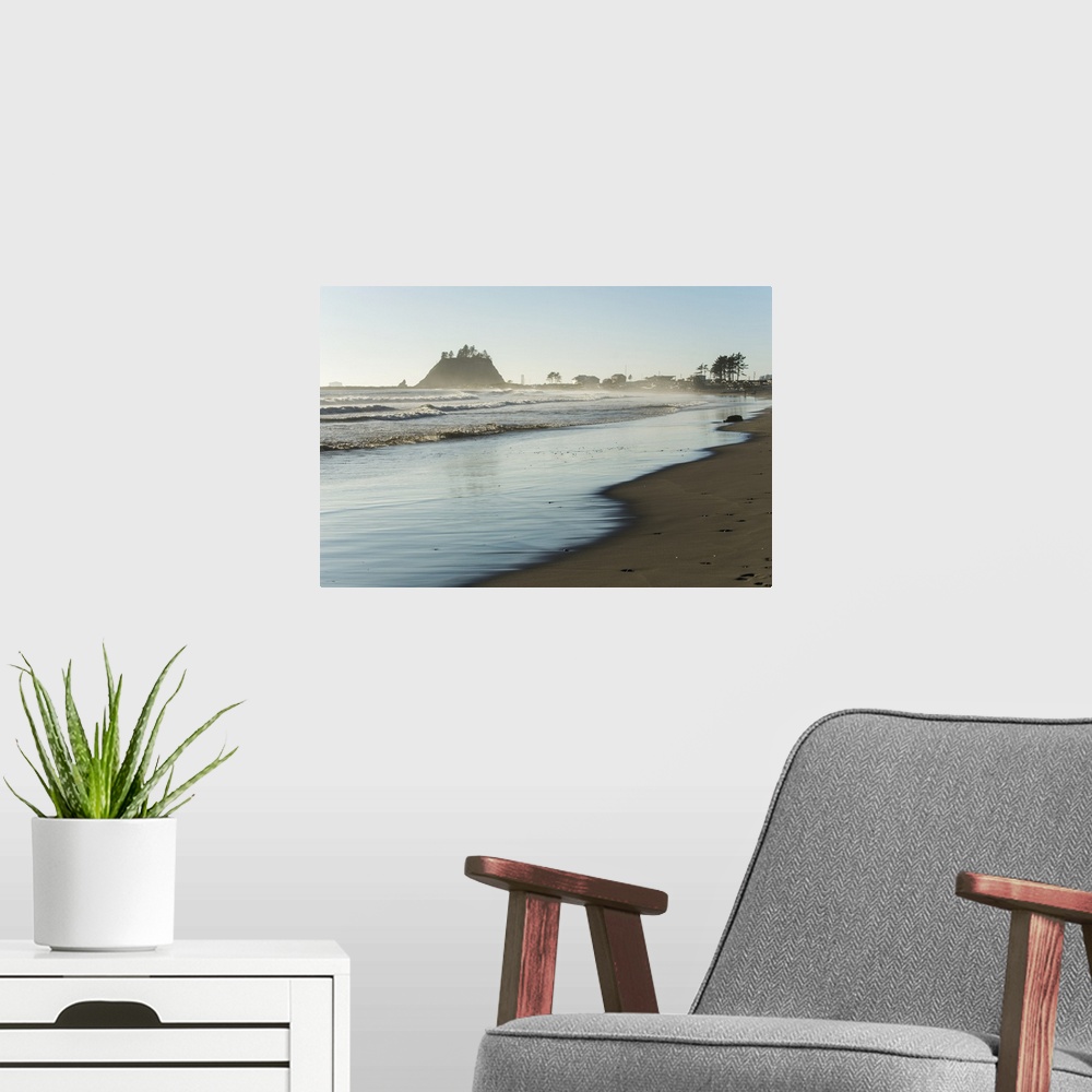 A modern room featuring Landscape photograph of the La Push Beach shore with misty rock cliffs in the background.