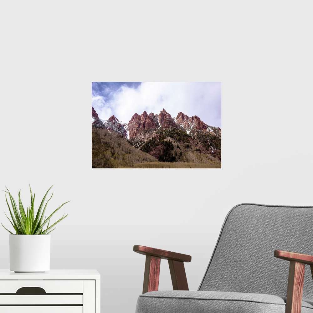 A modern room featuring Photo of majestic mountain peaks with fragments of snow in Colorado.