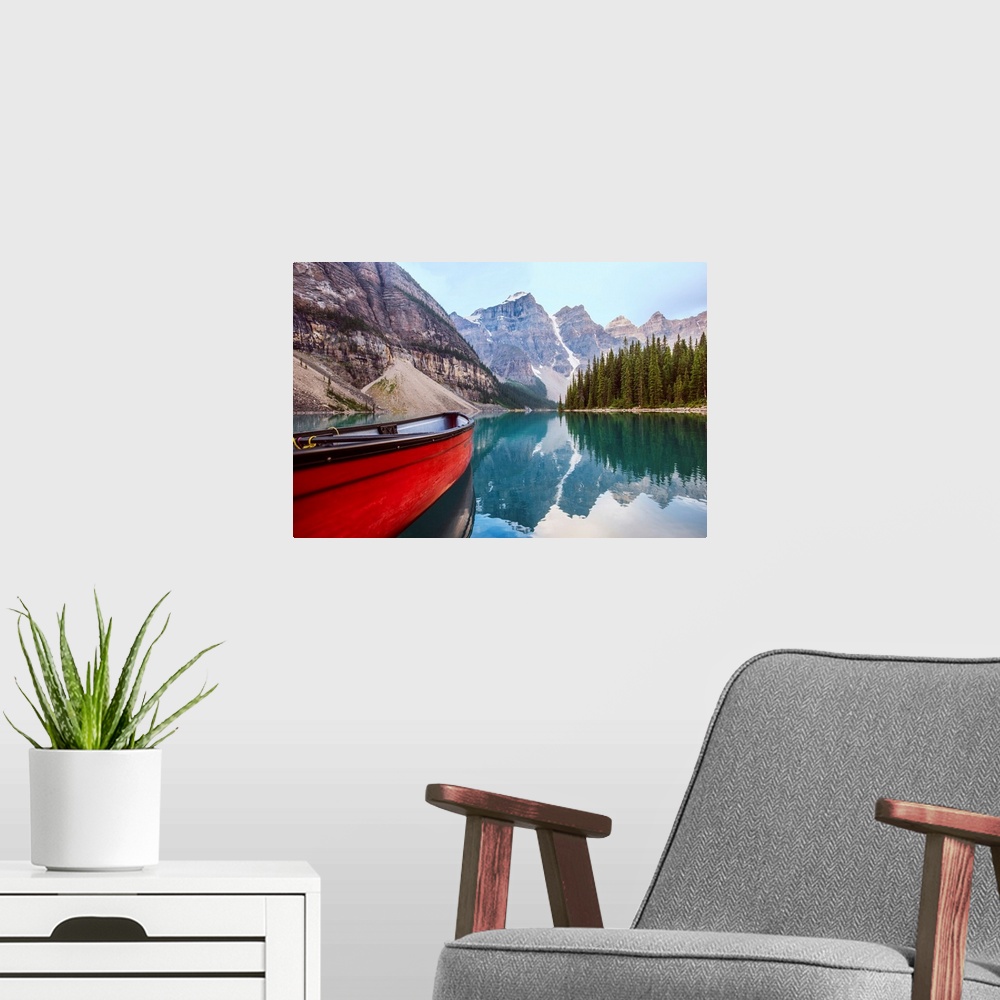 A modern room featuring A red canoe on Moraine Lake in Banff National Park, Alberta, Canada.