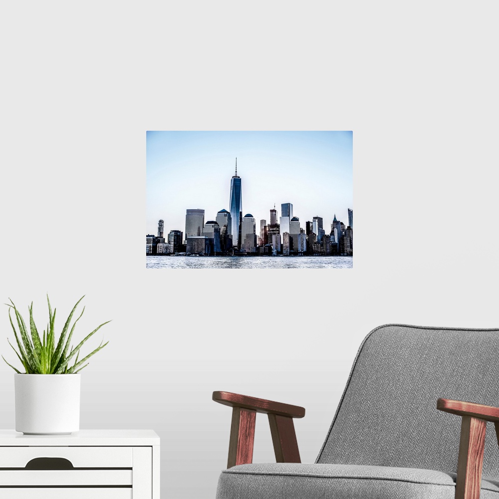 A modern room featuring View of the New York City skyline from across the Hudson River.
