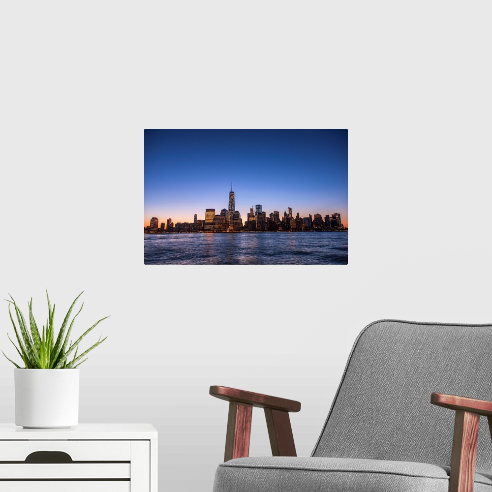 A modern room featuring The New York City Skyline, New York, seen in the morning.