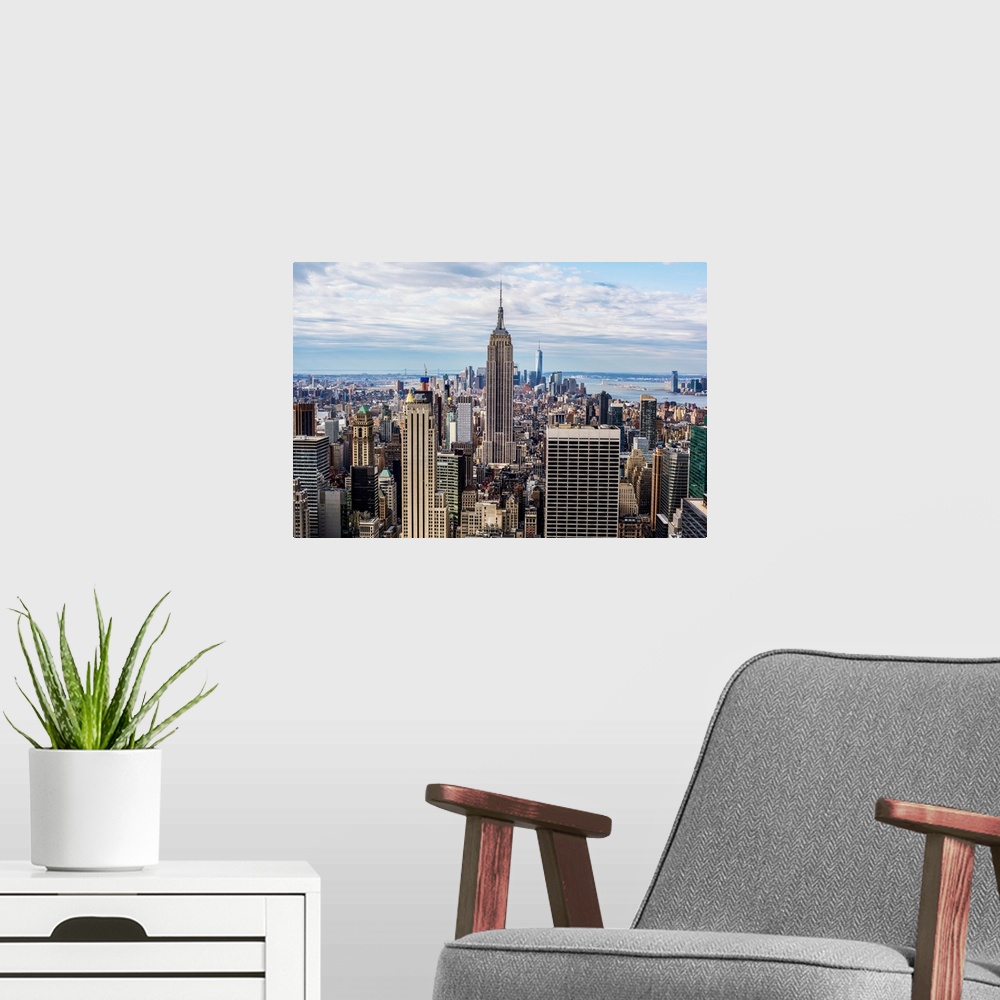 A modern room featuring View of the Empire State Building located in New York City, New York.