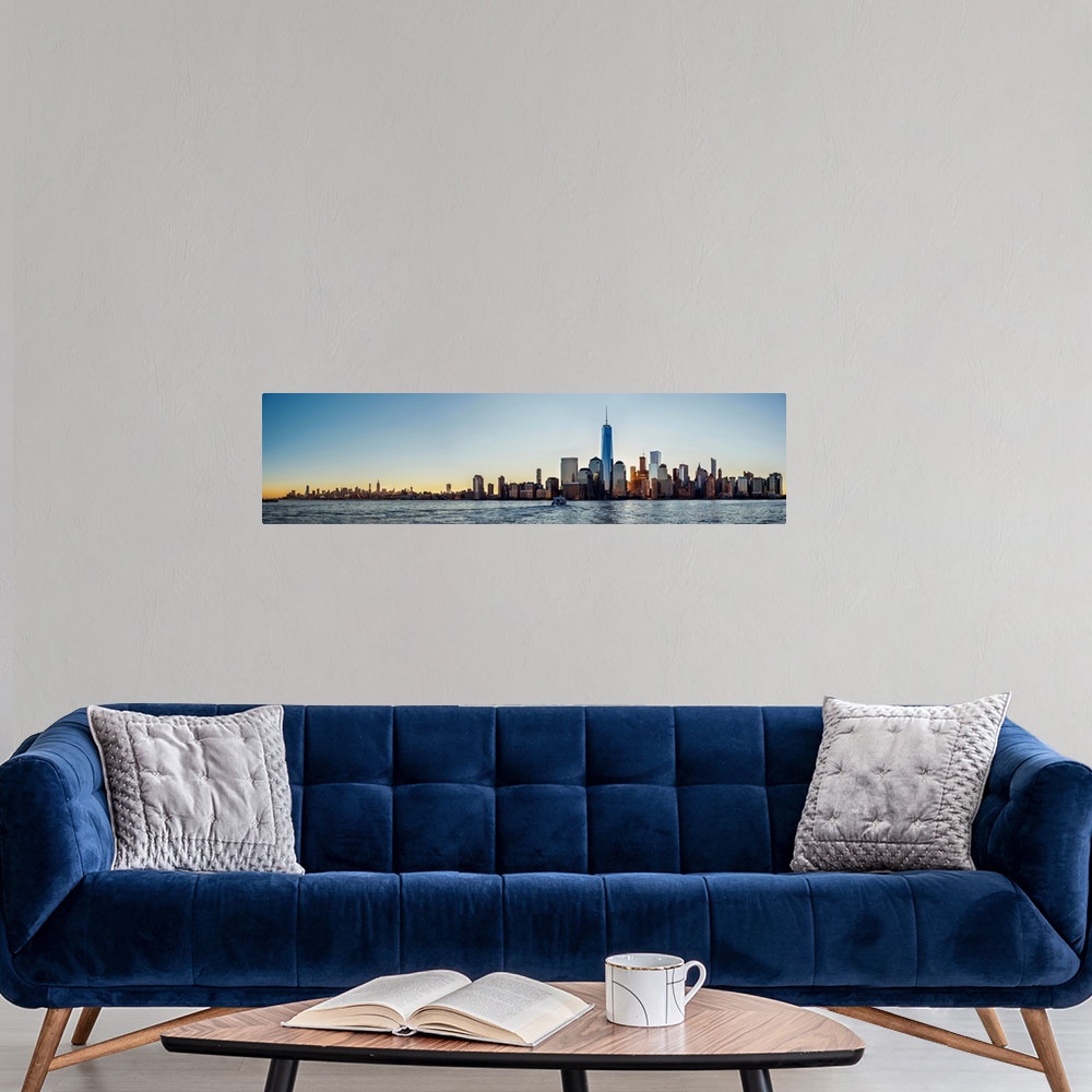 A modern room featuring View of the New York City skyline in the morning from across the Hudson River.