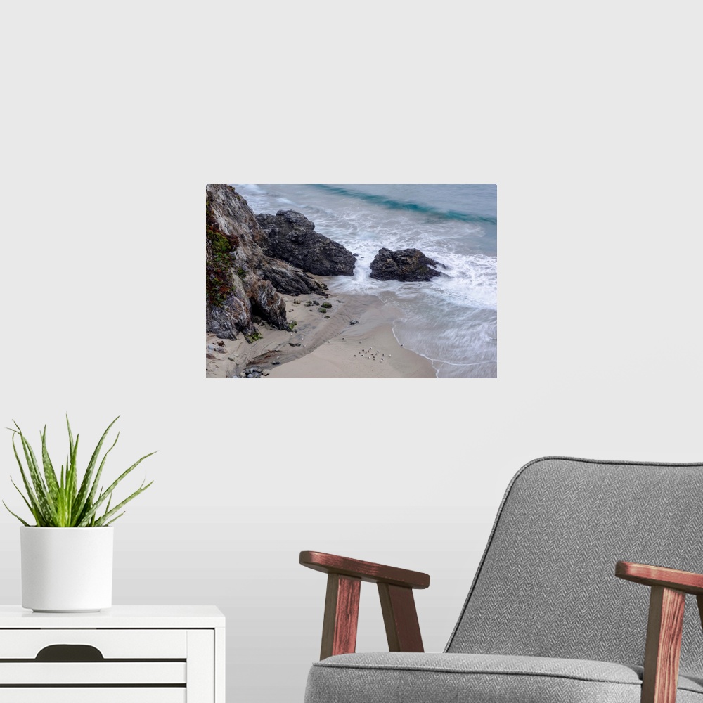 A modern room featuring View of Rocky Creek Bridge beach rocks in Monterey County, California.