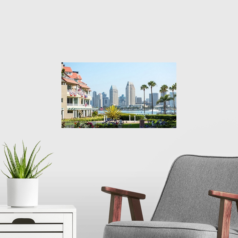 A modern room featuring Photograph of part of the San Diego, California skyline with flowers, palm trees, and American fl...