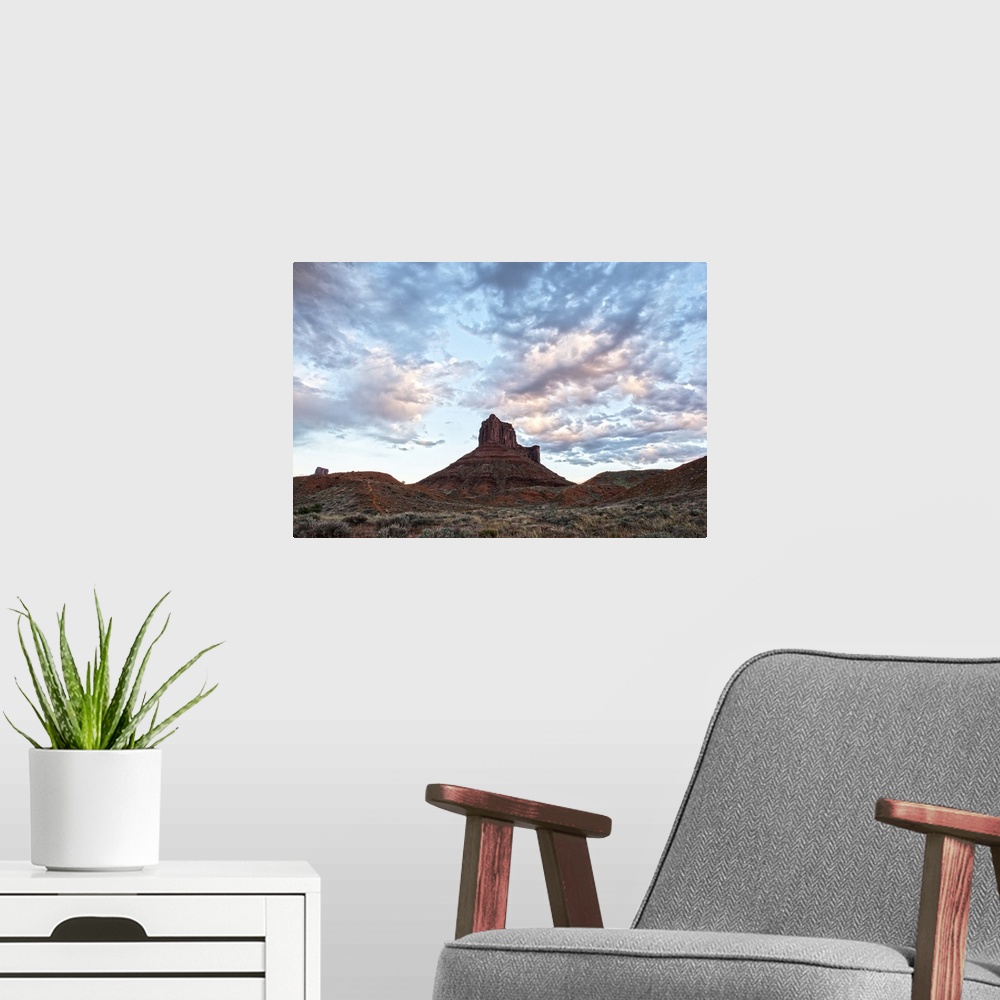 A modern room featuring Red sandstone tower rising over the desert landscape in Arches National Park, Utah.