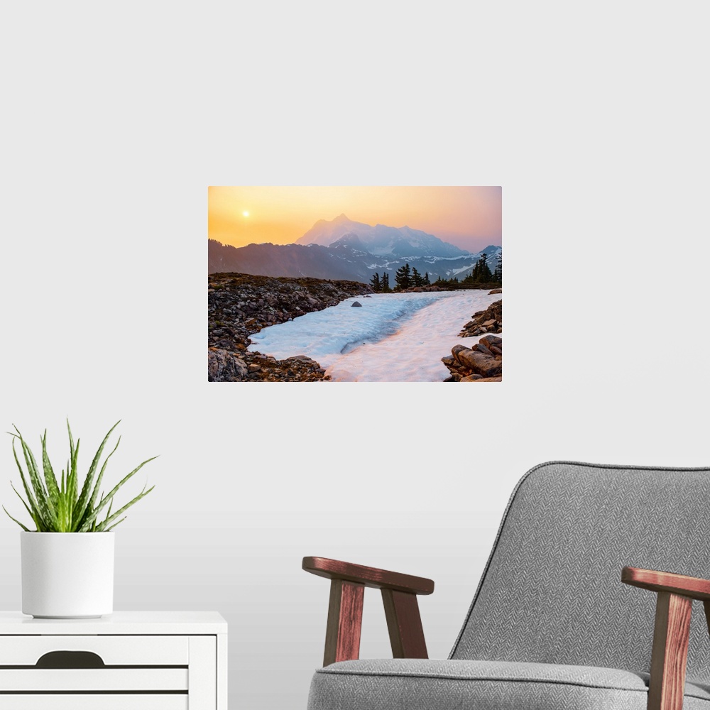 A modern room featuring View of a snowy path on Artist Point Trail with the sun rising over Mount Shuksan in the backgrou...