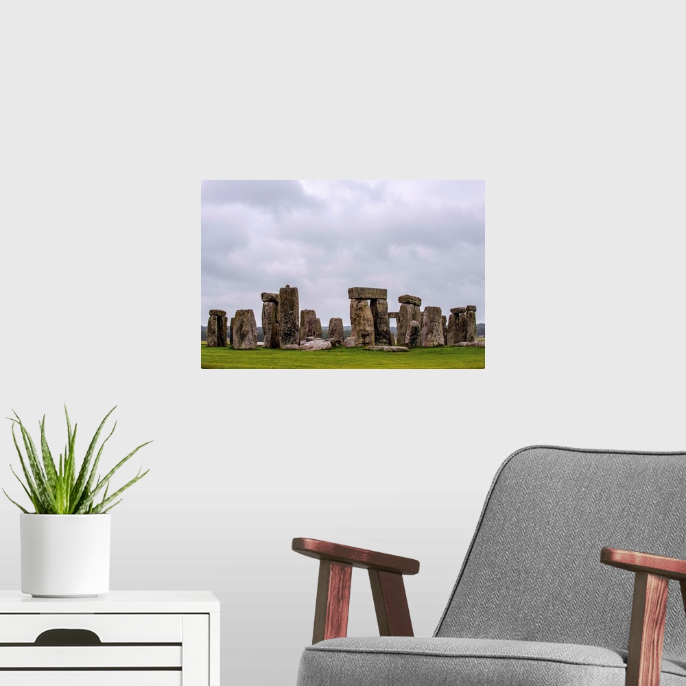 A modern room featuring Horizontal photograph of Stonehenge, a prehistoric monument and now a historic landmark in Wiltsh...