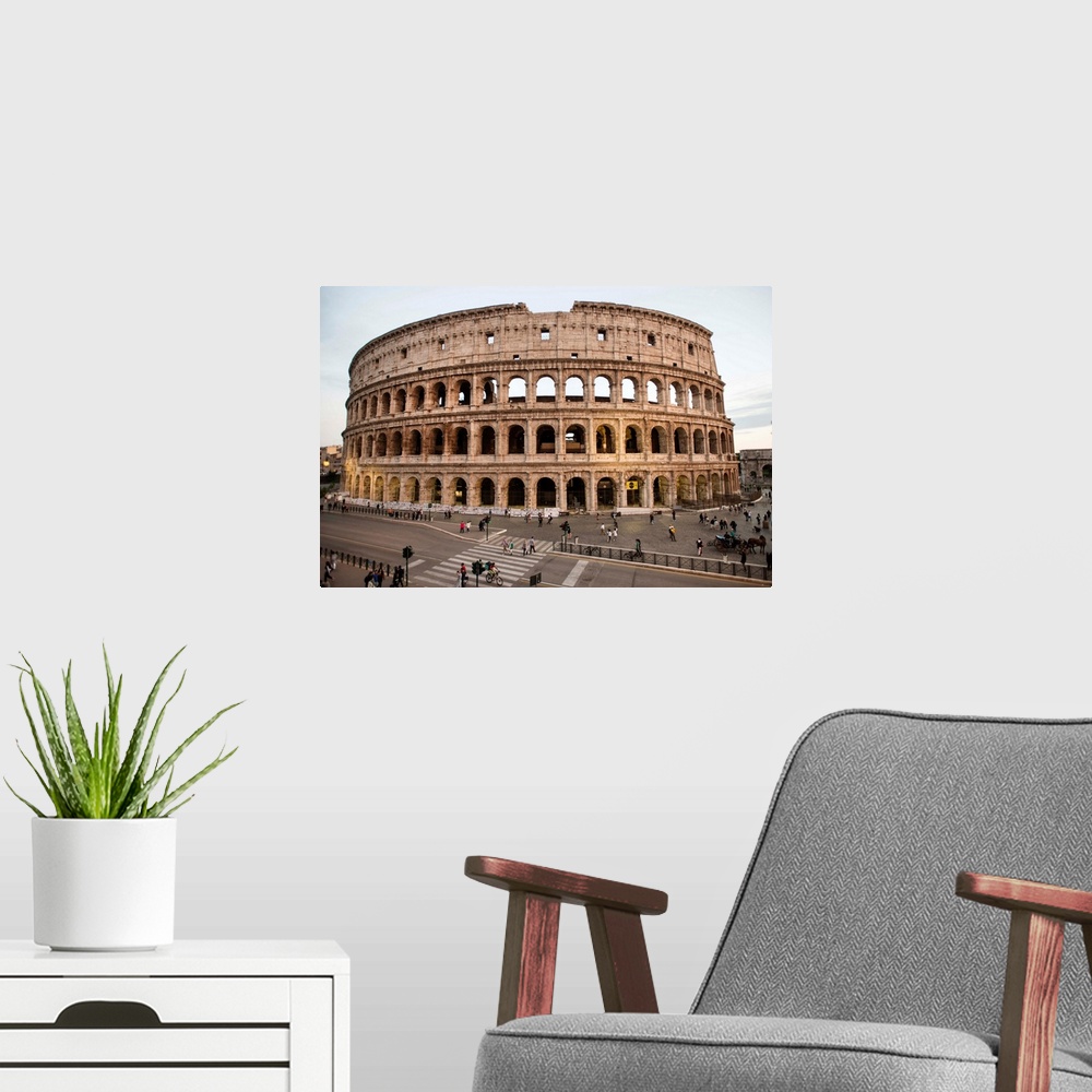 A modern room featuring Photograph of the Colosseum from across the street with tourists surrounding the grounds.