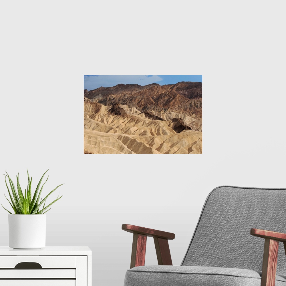 A modern room featuring View of the folding formations of Tucki Mountain in Death Valley, California.