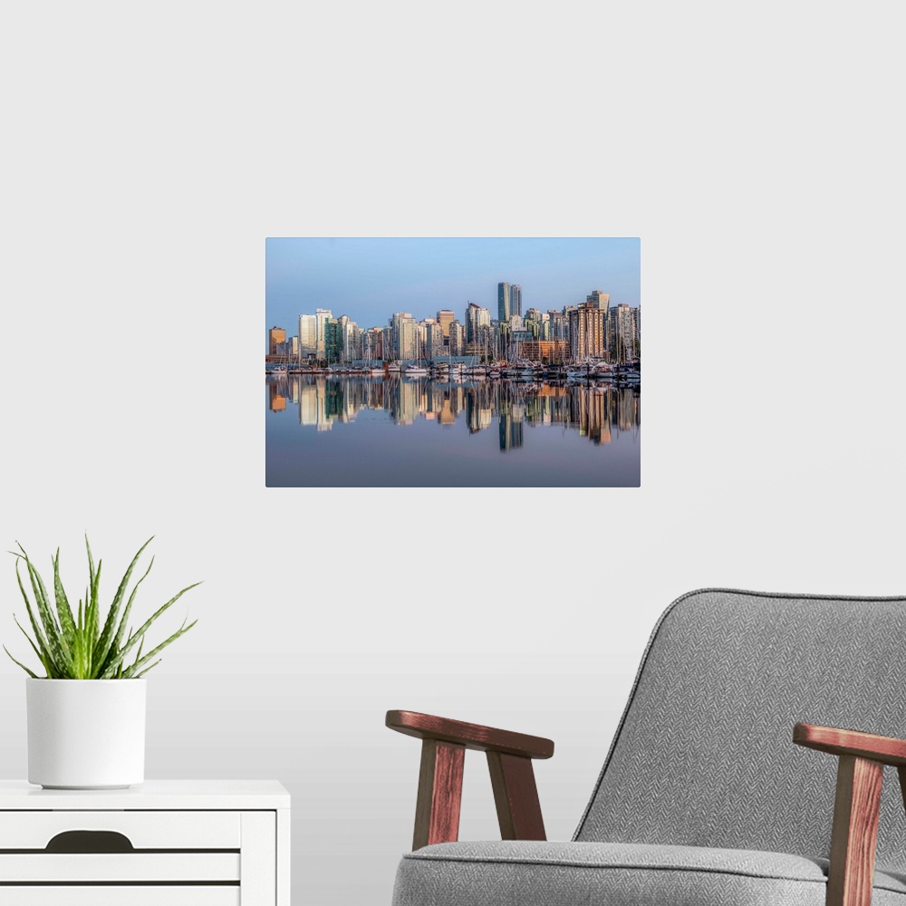A modern room featuring Vancouver skyline with boats in Vancouver, British Columbia, Canada.