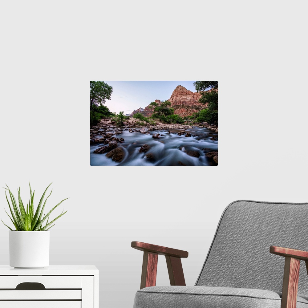 A modern room featuring View of Virgin River with 'Bridge Mountain' peak in the background, Zion National Park, Utah.