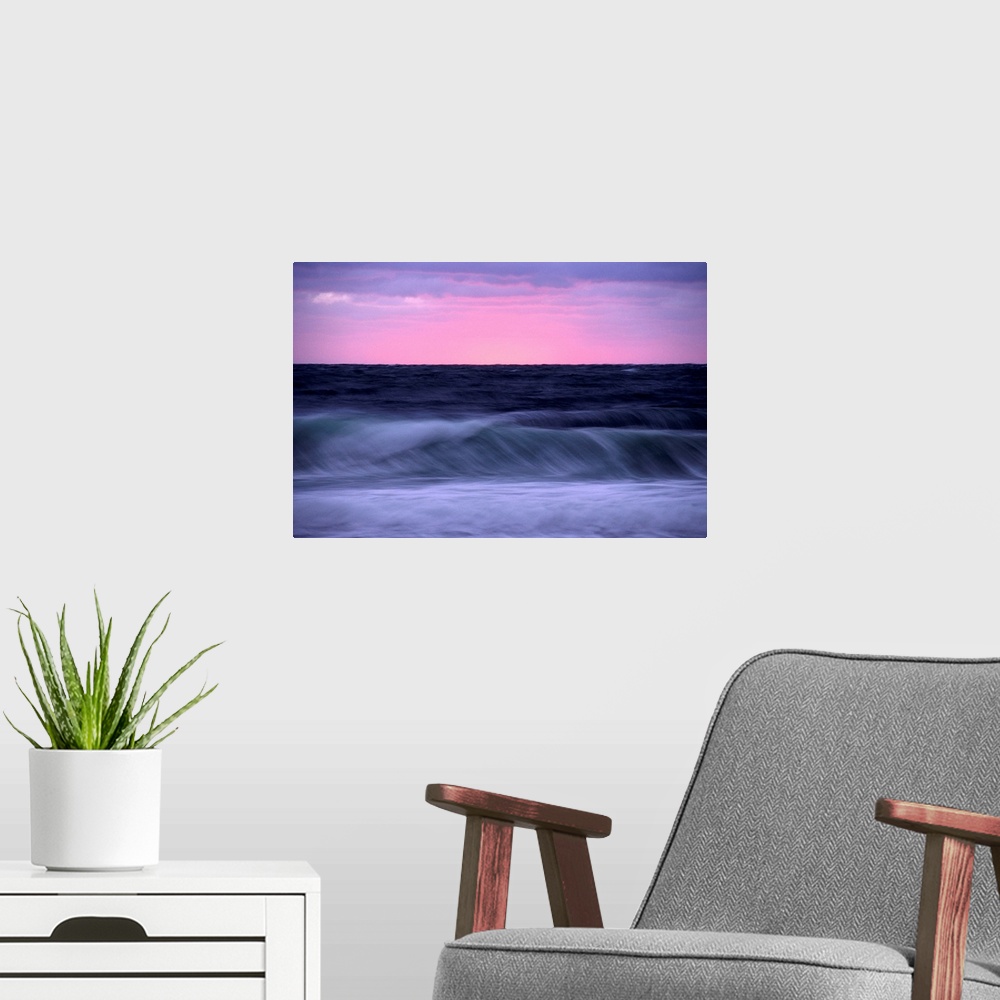 A modern room featuring Sunset and storm surf on the Gulf of St.Lawrence. This picture was taken from C ape Breton Highla...