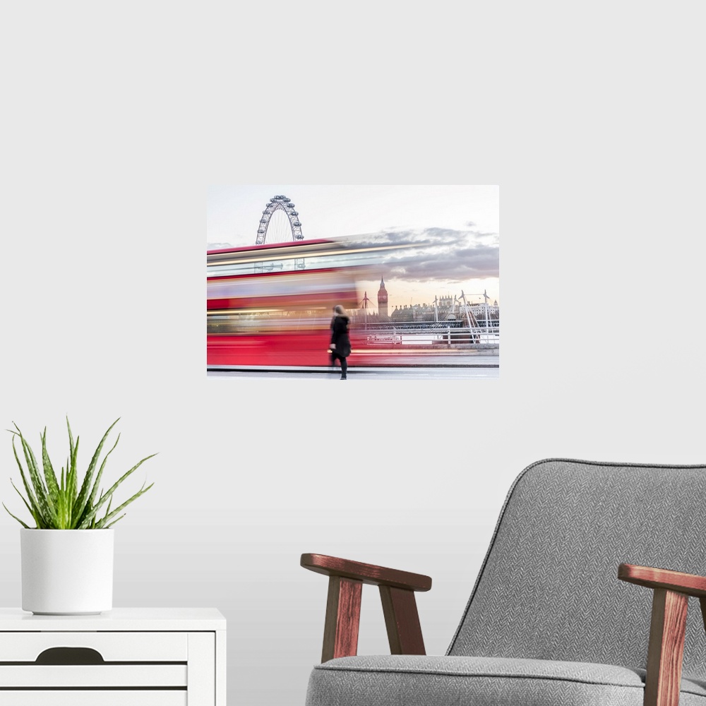 A modern room featuring A lady crossing Waterloo Bridge with a bus passing between her, the London Eye and Big Ben, Londo...